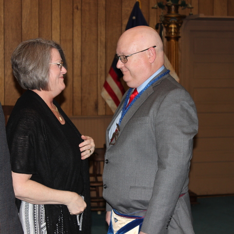 Deirdre Wilkins meeting Joe Wilkins in front of the Holy Alter 